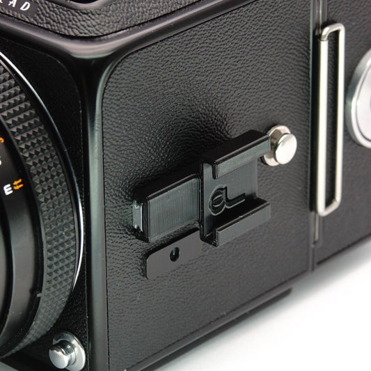 Adaptador de zapata para flash para cámaras Hasselblad 500C/M y T-Rail (ISO zapata fría)