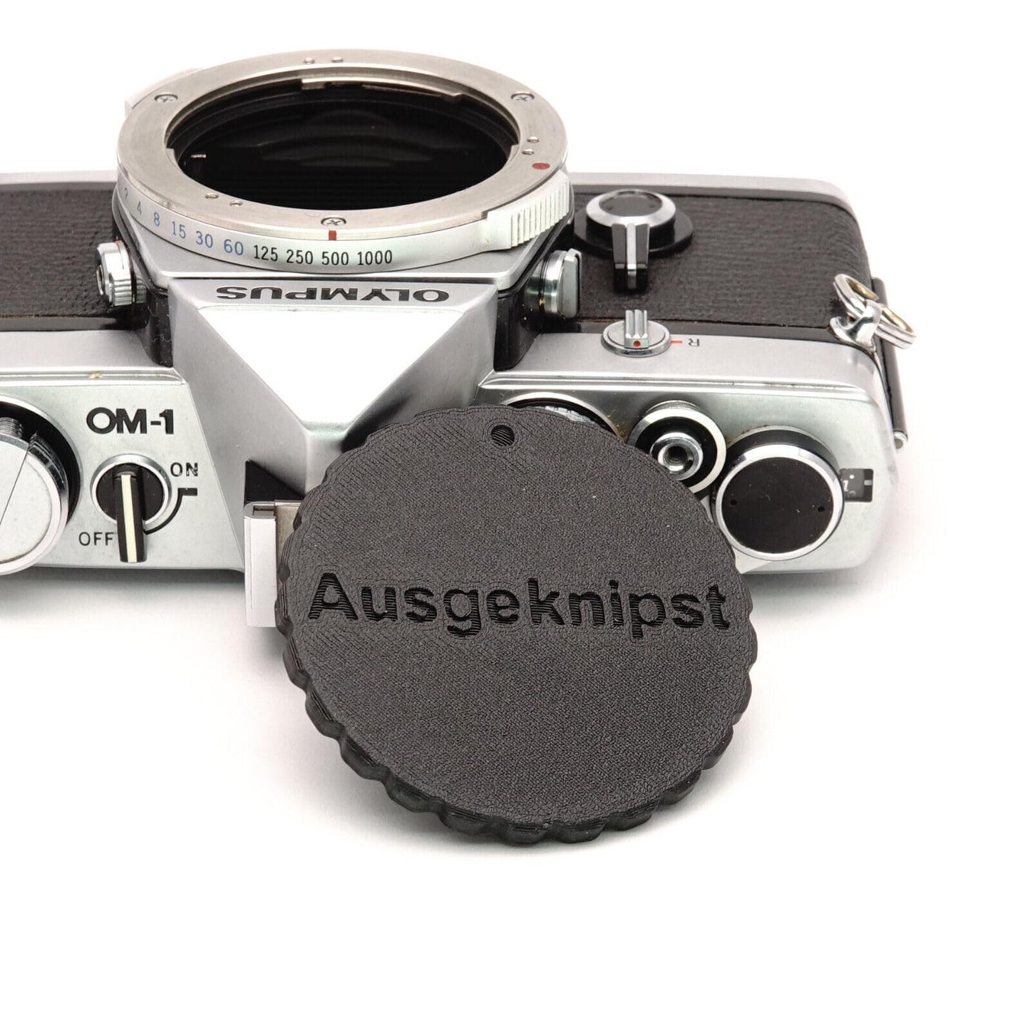 Copriobiettivo per fotocamere Olympus OM (OM-1, OM-2, OM-4, OM-10)