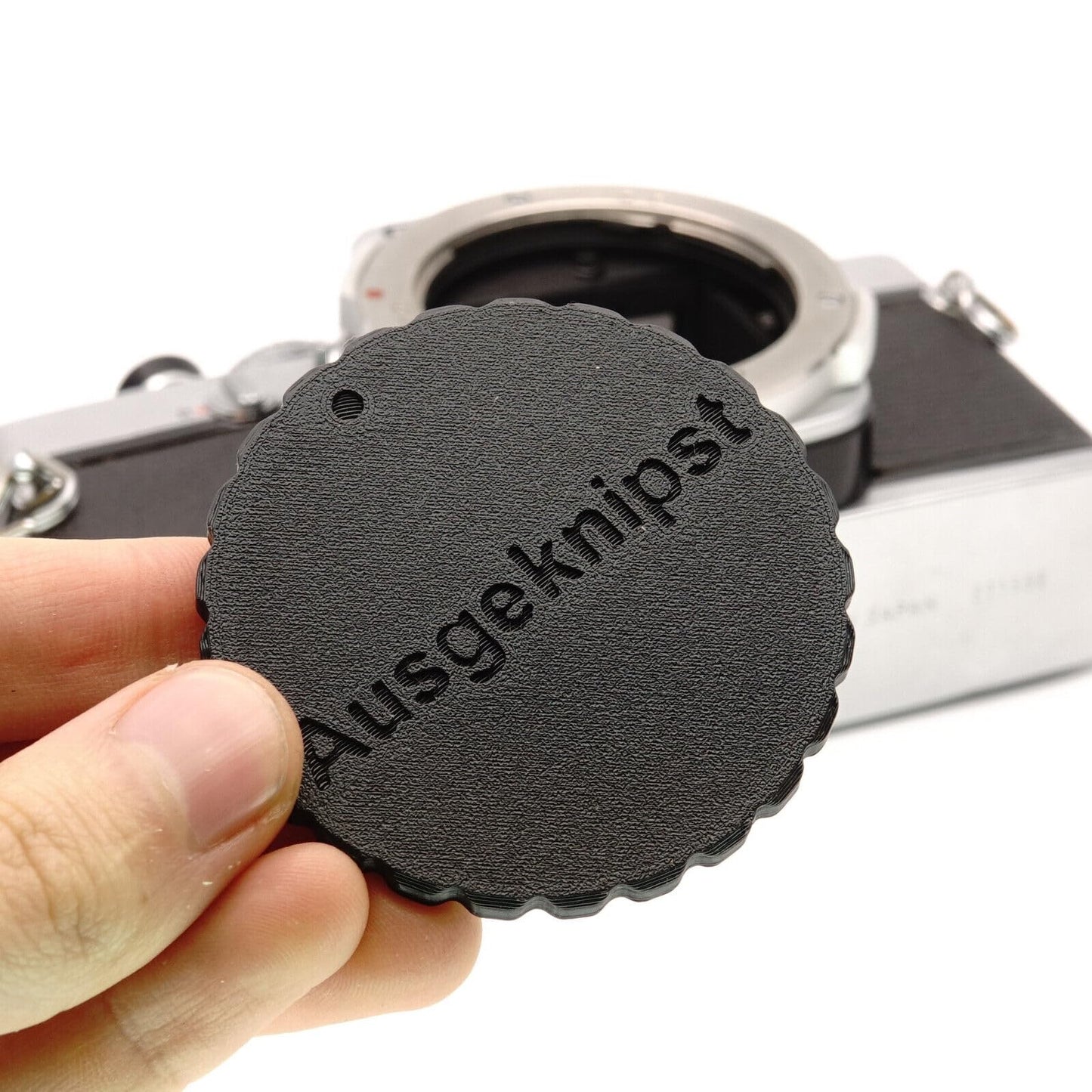 Copriobiettivo per fotocamere Olympus OM (OM-1, OM-2, OM-4, OM-10)